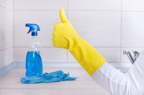 Technician using carpet cleaning equipment in Camden Town